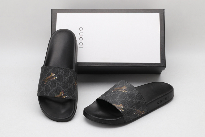 G*u*i slides all black with "tiger"