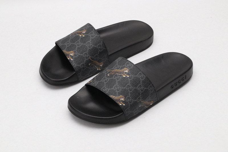 G*u*i slides all black with "tiger"
